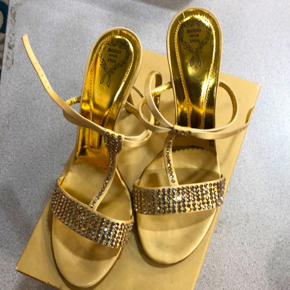 Gold Italian Rodo shoes.